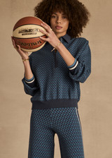 THE UPSIDE women's blue organic cotton Lumiere Zane Knit Collared Top is designed for a relaxed fit and features a geometric star design. Made for lifestyle.