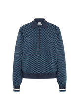 THE UPSIDE women's blue organic cotton Lumiere Zane Knit Collared Top is designed for a relaxed fit and features a geometric star design. Made for lifestyle.