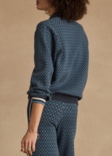 THE UPSIDE women's blue organic cotton Lumiere Zane Knit Collared Top is designed for a relaxed fit and features a geometric star design. Made for lifestyle.