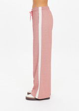 THE UPSIDE women's pink Galaxia Loretta Pant is designed for a mid to low rise straight leg fit and features elasticated waistband, drawcord and side seam pockets. Made for lifestyle.
