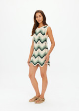 THE UPSIDE women's green organic cotton Tidal Sandrine Crochet Dress features a keyhole opening at the back with knitted tie. The perfect piece for vacation.
