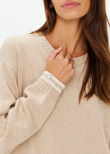 THE UPSIDE women's sand wool cotton blend Xanthe Crew Neck Sweater is designed for a relaxed boxy fit and features contrast cream stripes. Perfect for everyday.