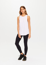 THE UPSIDE women's white Dri Release Markova sleeveless Tank is made from moisture-wicking, fast-drying fabric with odor control and superior comfort.