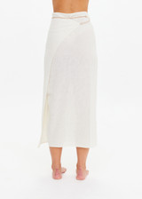 THE UPSIDE women's cream Beach Serenade Wrap Sarong is made from cotton. The beach sarong skirt features vegan leather braided belt. Designed for layering and travel.