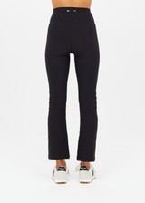 THE UPSIDE women's black Peached Thia Crop Flare is a high-waisted 7/8 length flared pant with a soft folded waistband in recycled peached fabric. Made for yoga & pilates.