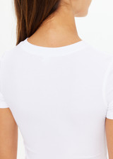 THE UPSIDE women's white Shelter Fitted Tee is made from soft modal rib fabrication and features a embroidered arrow logo at back of neck. Made for everyday wear.
