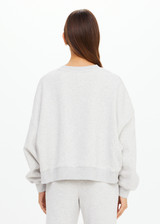 THE UPSIDE women's grey Paloma Crew offers a relaxed fit with drop shoulder and The Upside logo printed on front chest. The perfect everyday jumper.