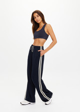 THE UPSIDE women's black Empire Marnie Wide Leg Pant is high-waisted and features a elasticated waistband with drawcord and side pockets. Made for lifestyle.