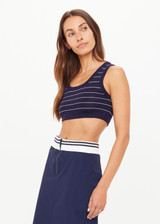 THE UPSIDE women’s Stripe Astra Solange Knit Crop Top offers a soft, comfortable fit with a navy-ribbed scoop neckline and elastic underbust. Perfect for travel or daily wear.