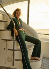 THE UPSIDE women’s green Maneki Pari Zip Jacket in Lenzing viscose features a zip-through design with striped knit tape down the sleeves. Made for everyday leisure.