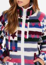 THE UPSIDE women’s Harlow Fleece Zip Through in multi star design features a relaxed fit, contrast woven binds, and a zip chest pocket. Made for everyday wear.