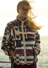 THE UPSIDE women’s Harlow Fleece Zip Through in multi star design features a relaxed fit, contrast woven binds, and a zip chest pocket. Made for everyday wear.