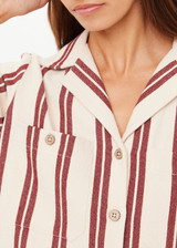 THE UPSIDE women's stripe organic cotton Baja Katia Collared Shirt has a relaxed fit, patch pockets on the chest, and wooden coconut button closure. Perfect for everyday wear.