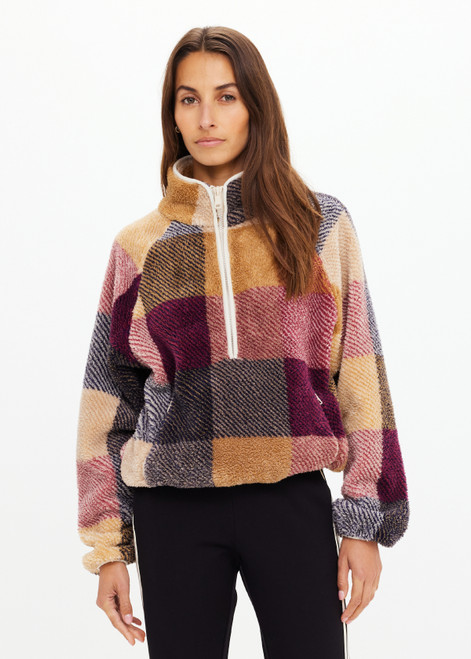 THE UPSIDE women's check recycled fabric Ayr Harlow Fleece Pullover is designed for a relaxed fit and features zip pockets and elasticated waist and cuffs. Made for lifestyle.