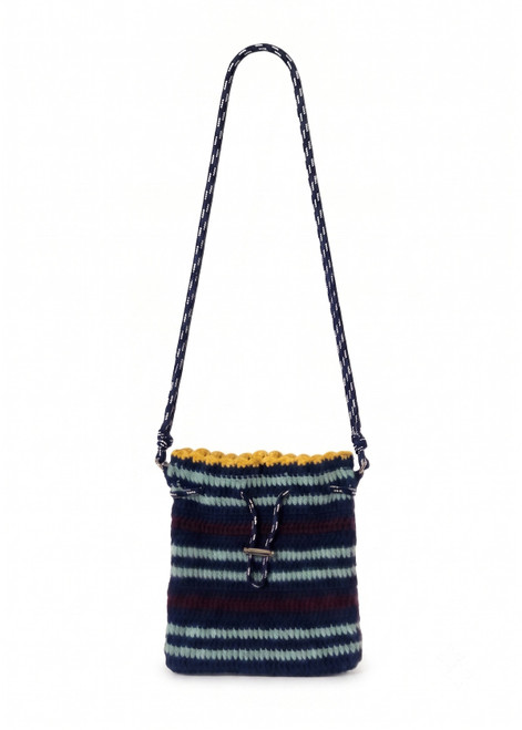 THE UPSIDE women’s stripe organic cotton Cabana Crochet Mini Bag is crossbody and handmade with a navy paracord strap and cord with toggle. Made for lifestyle.