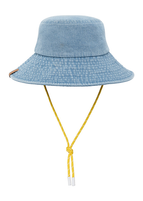 THE UPSIDE women's Washed Denim Bucket Hat features a wide brim silhouette, adjustable chin strap and topstitched detailing. Made for lifestyle.