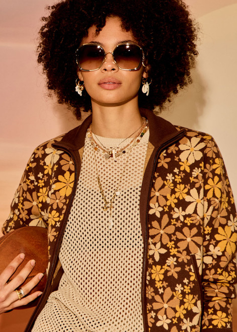 THE UPSIDE women's floral organic cotton Copacabana Margot Knit Jacket offers a relaxed fit and features a floral knit jacquard design, front pockets and contrast ribbed trims. Made for lifestyle.