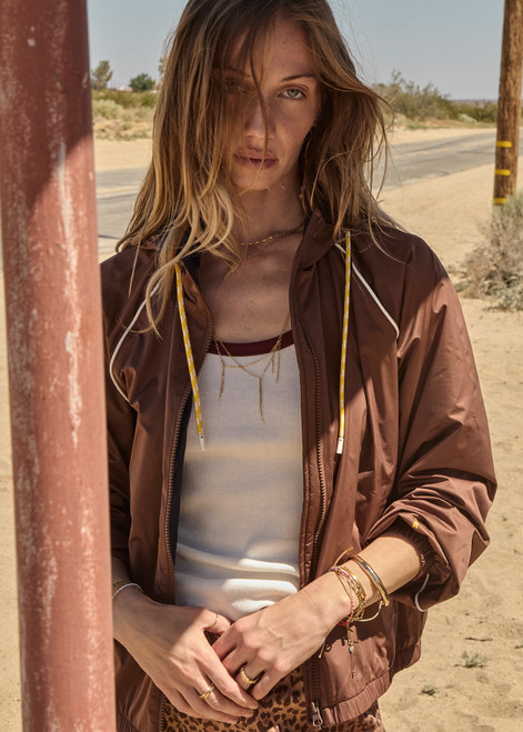 THE UPSIDE women’s brown recycled fabric Lila Zip Through Jacket is designed for a regular fit and features contrast piping, front pockets and a drawcord hem. Made for running.
