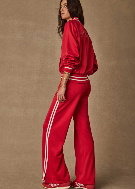 THE UPSIDE women's red When In Roma Holiday Pant is high waisted with an elasticated waistband, made from double faced single jersey fabrication with cream mesh tape along side seams. Made for lifestyle.