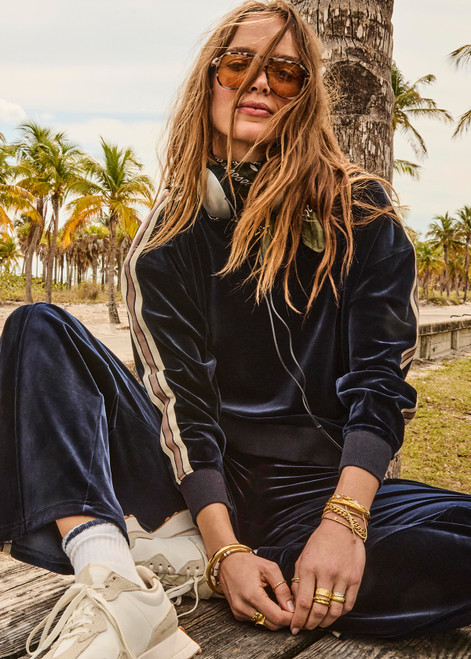 THE UPSIDE women's navy Monaco Lisel Crew Neck Sweater is a soft recycled velour fabric in a relaxed fit with a dropped shoulder. The perfect travel or everyday piece.THE UPSIDE women's navy Monaco Lisel Crew Neck Sweater is a soft recycled velour fabric in a relaxed fit with a dropped shoulder. The perfect travel or everyday piece.