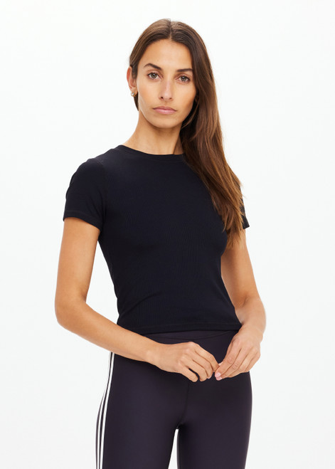 THE UPSIDE women's black Shelter Fitted Tee is made from soft modal rib fabrication and features a embroidered arrow logo at back of neck. Made for everyday wear.