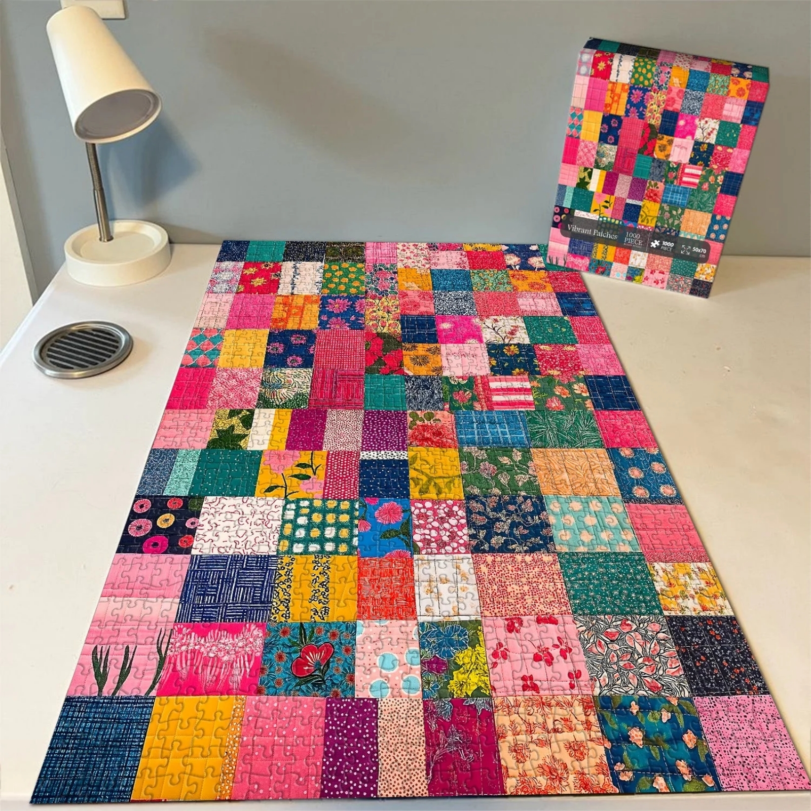 Vibrant patch 1000 piece jigsaw puzzle is made of recyclable three-layer cardboard and preciely cut for a snug fit. It features high resolution, matte finish and smooth edging.