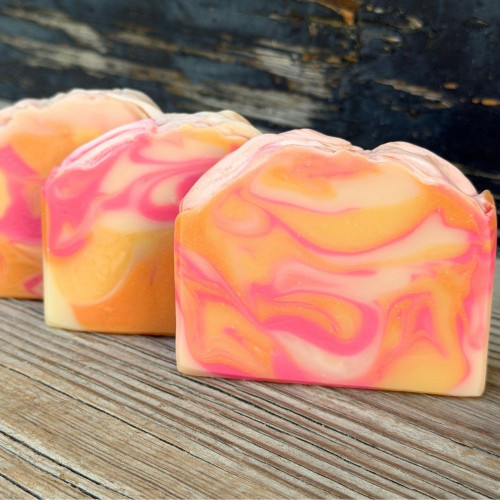 Brightly colored Sangria goat milk soap