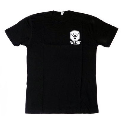 Front view of WEND logo t-shirt. Black cotton with white screen printed logo on chest. Front view of WEND logo t-shirt. Black cotton with white screen printed logo on chest.