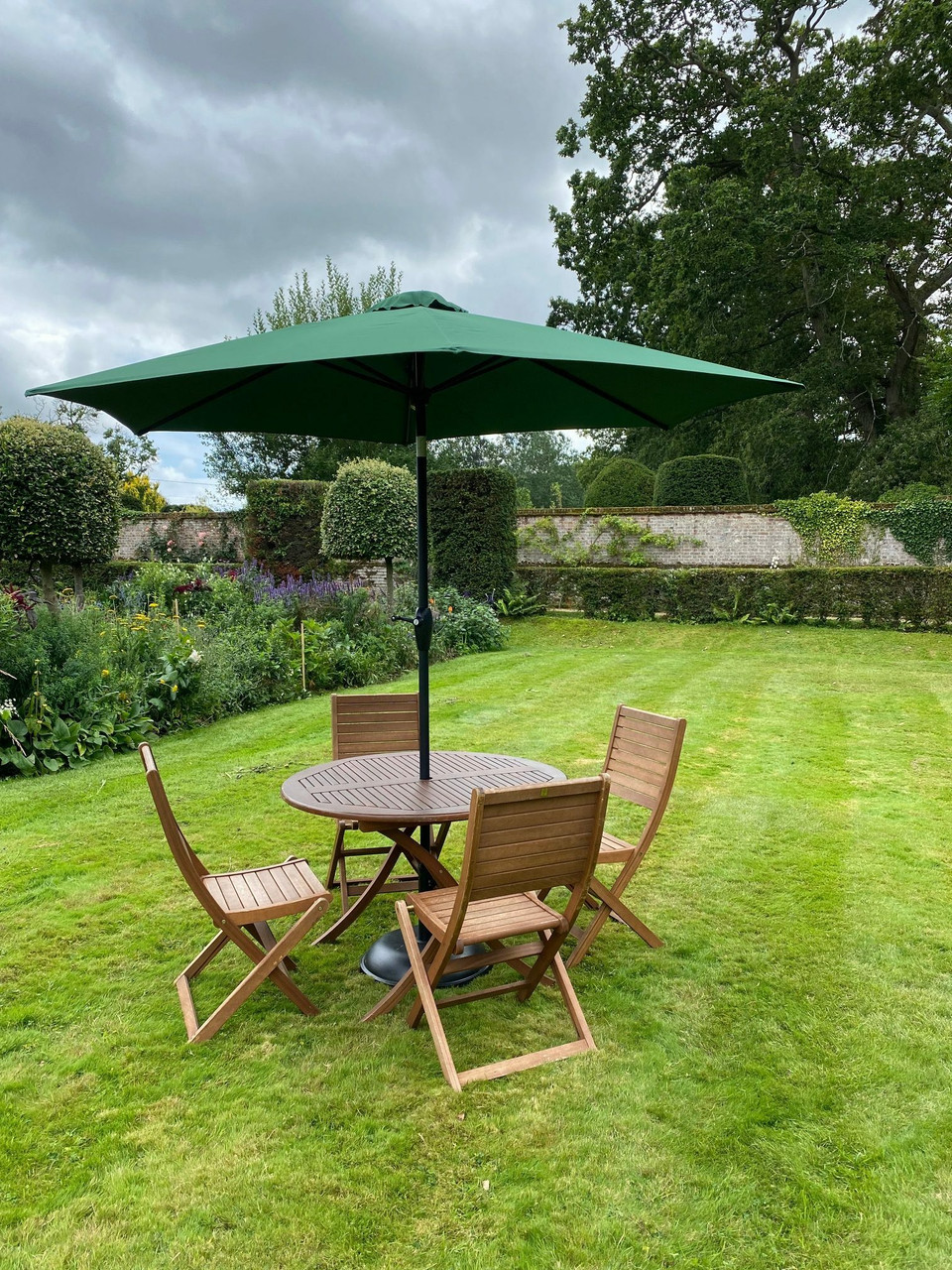 Tables Chairs Umbrellas and Stands