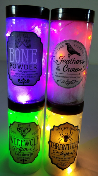 Celebrations 5.5" Prelit Poison Jars Halloween Decor – Assorted 4‑Piece Set, 8 Micro LED Lights Per Jar, Tarantula/Bone/Werewolf/Crow Themed