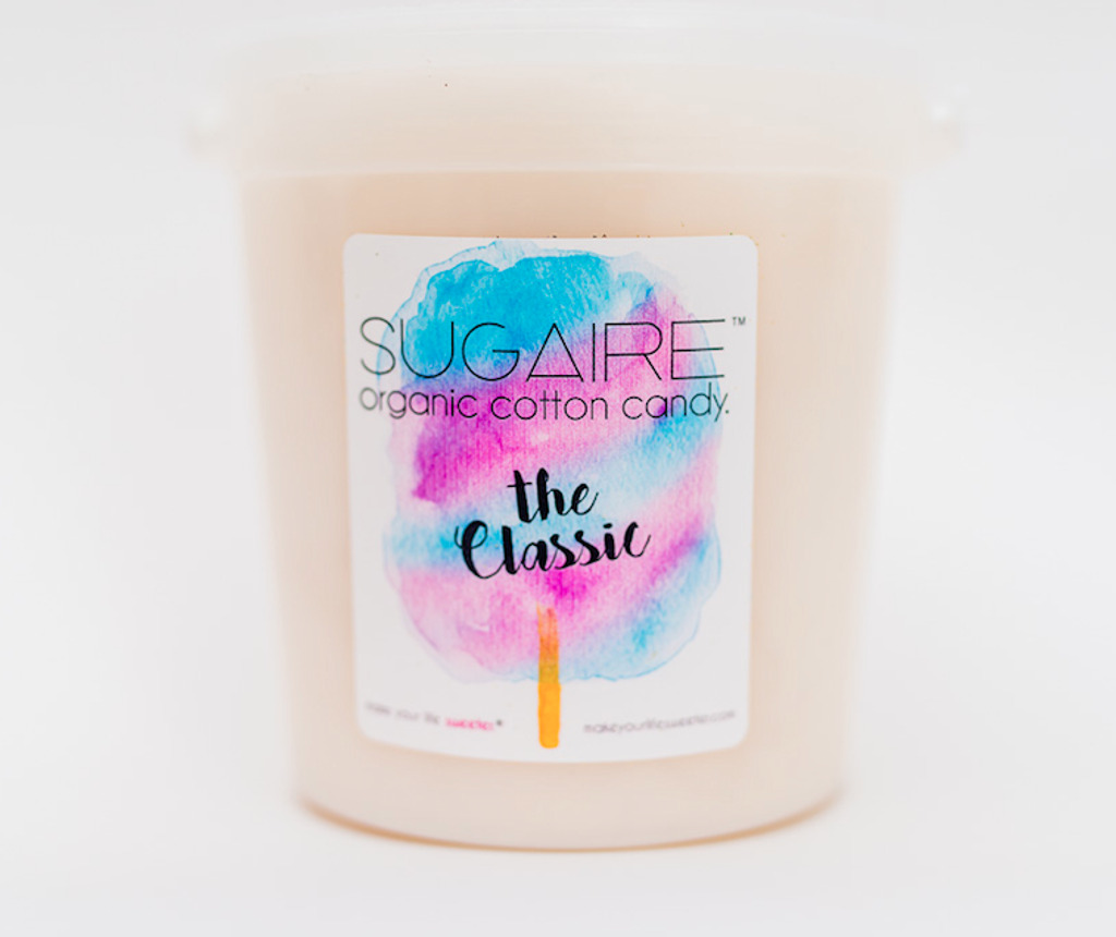 Sugaire® presents The Sweet Bucket with Handle, a delightful indulgence that takes organic cotton candy to a new level of sweetness. Handcrafted with care and made from USDA certified organic ingredients, this 32oz bucket of fluffy goodness is perfect for sharing and creating lasting memories. Experience the enchanting taste and delicate texture as each melt-in-your-mouth bite transports you to a whimsical world of sugary delight. Whether you're hosting a party, organizing an event, or simply treating yourself, The Sweet Bucket with Handle is a must-have for cotton candy enthusiasts. Elevate your sweet moments with Sugaire's USDA Certified Organic Cotton Candy.   