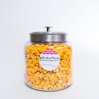 Create a memorable snacking experience with the DIY HotPoppin Gourmet Popcorn Bar. This customizable popcorn bar kit includes 1 glass jar filled with gourmet popcorn, offering 35 servings of deliciousness. Unleash your creativity by setting up a popcorn bar at parties, events, or even in the comfort of your own home. Mix and match flavors from our extensive range of gourmet popcorn options, including Classic Butter, Zesty Cheddar, Sweet Caramel, and more. Let your guests personalize their popcorn with various toppings, seasonings, and drizzles for a truly unique and mouthwatering treat. The DIY HotPoppin Gourmet Popcorn Bar is the ultimate crowd-pleaser that will leave everyone craving for more.