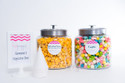 Get ready to create a popcorn experience like no other with the DIY HotPoppin Gourmet Popcorn Bar. This unique set includes three glass jars filled with our delicious gourmet popcorn, allowing you to customize your snacking adventure. Each jar is filled with a variety of flavors, from classic butter to zesty jalapeno and sweet caramel. With 100 servings in total, you can delight your guests at parties, events, or even create your own popcorn bar at home. Let your creativity shine as you mix and match flavors, and watch everyone enjoy the magic of HotPoppin Gourmet Popcorn. Elevate your gatherings and bring a memorable popcorn experience to life with the DIY HotPoppin Gourmet Popcorn Bar.