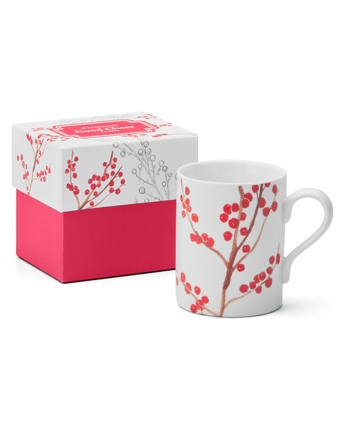 Red berry cup of cheer mug displayed beside matching decorative gift box.