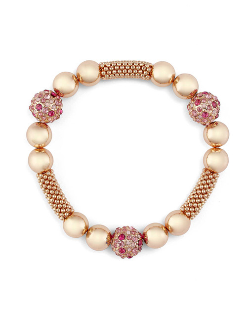 Golden pavé crystal bracelet with pink beads and textured accents.