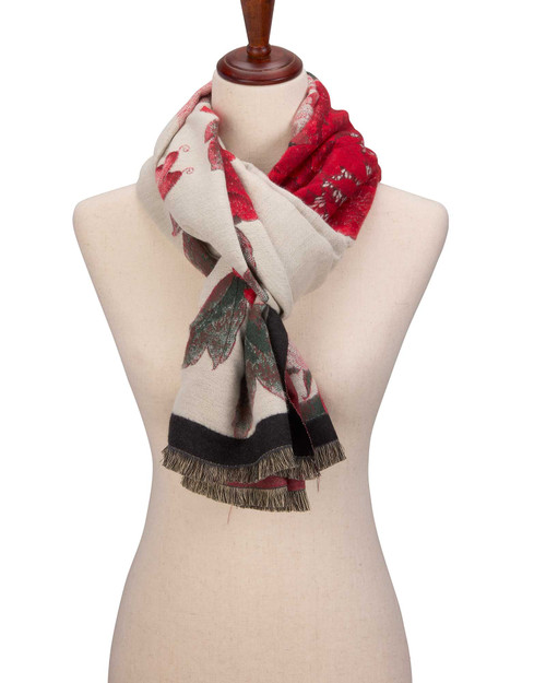 Mannequin displays silk scarf with a red blossom pattern.