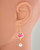 Japanese jewelry earrings modeled on mannequin to show length. View Product Image