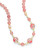 Close view of pink floral Japanese jewelry featuring handcrafted tensha bead details View Product Image