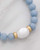 Detailed look at a mother-of-pearl bead featured in angelite jewelry. View Product Image