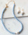 Angelite jewelry set featuring the necklace and matching earrings. View Product Image