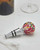 Red Murano glass bottle stopper shown on a bright white surface. View Product Image