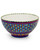 Artisan-crafted colorful ceramic bowl featuring cheerful dots and tactile texture. View Product Image