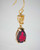 Citrine dangle earrings close-up showing gemstone clarity and polished gold finish. View Product Image