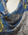 Navy floral scarf close-up highlighting fine linework and layered botanicals. View Product Image