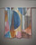 Slate abstract print scarf draped to show its layered shapes. View Product Image