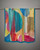 Cobalt abstract print scarf hung to reveal its modern brushstroke pattern. View Product Image