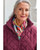 Silk square scarf worn by a woman, featuring a bold multicolor windowpane design. View Product Image