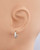 Sterling Silver Diamond Huggie Hoop Earrings View Product Image
