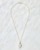 Emerald and Baroque Pearl Pendant Necklace View Product Image