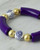 Close-up of royal blue bracelet highlighting porcelain beads and shimmering gold accents. View Product Image